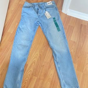 Light wash blue denim jeans.